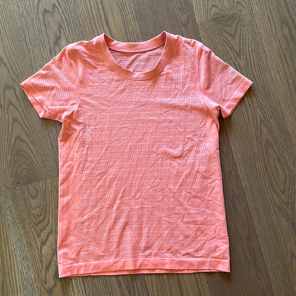 Lululemon size 6, relaxed version of a  swiftly shirt, peach color